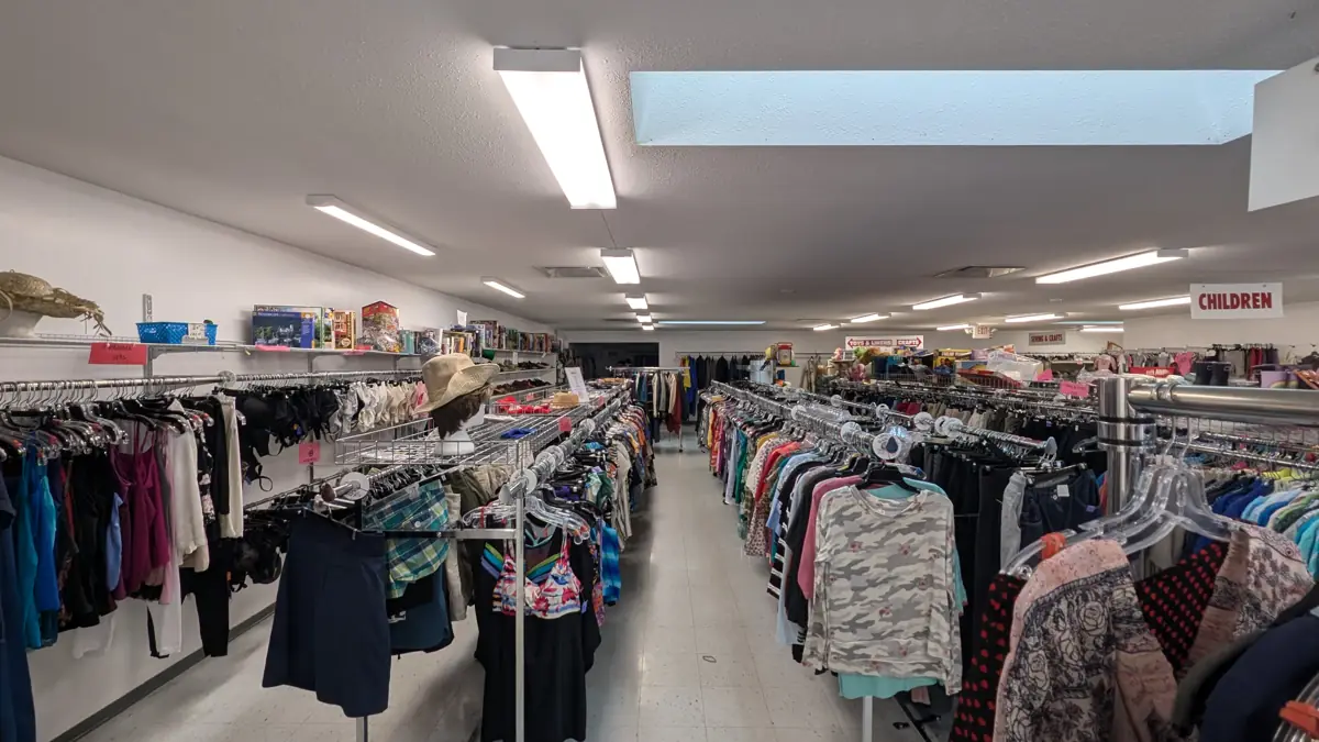 Clothing racks inside the Gleaners thrift store